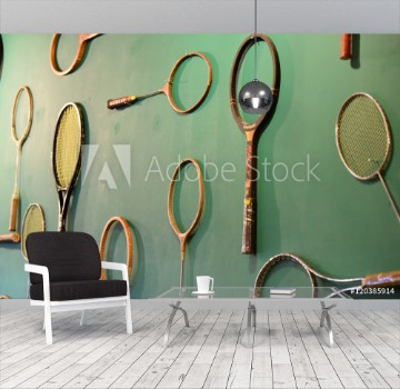Picture of tennis racket on the wall